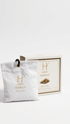 Oud based caphor car perfume named oudello in white background depicting the natural and transparent smell of the car perfume.