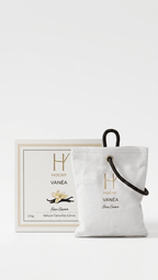 Vanilla based camphor car perfume made by hogny known as vanea in white background with minimal, elegant and luxury design.